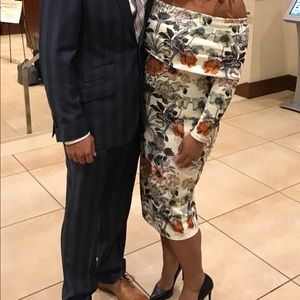 Off the shoulder scuba material dress.